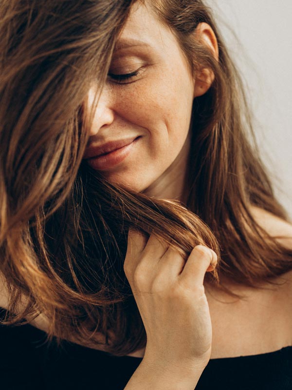 woman smiling serenely