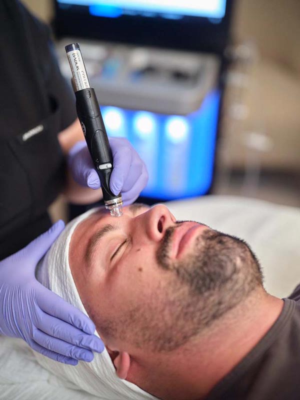 man getting hydrafacial